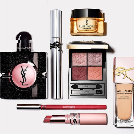 Flat-Lay von YSL Beauty-Produkten mit Parfum, Pflege und Make-up.