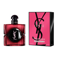 Flacon Black Opium Eau de Parfum Pink Glaze a cote de sa
                        boite fuchsia et noire ornee du Cassandre YSL.